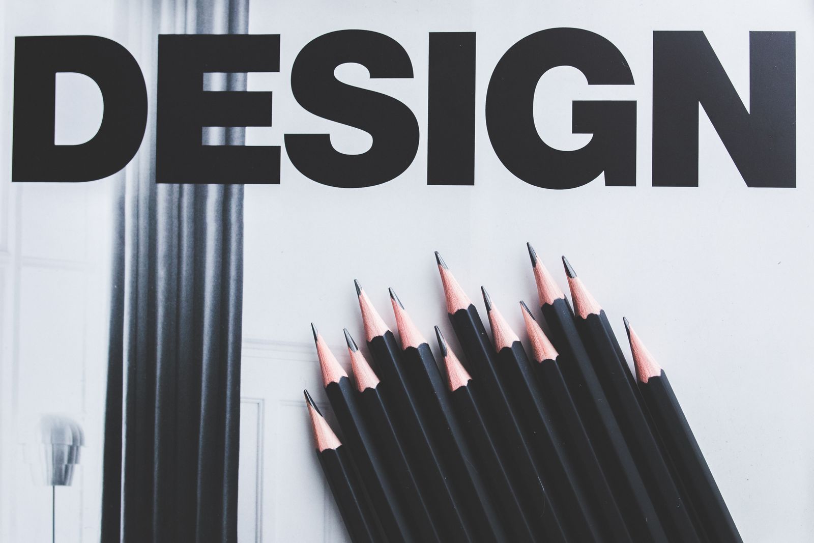 Design studio pencils and typography layout